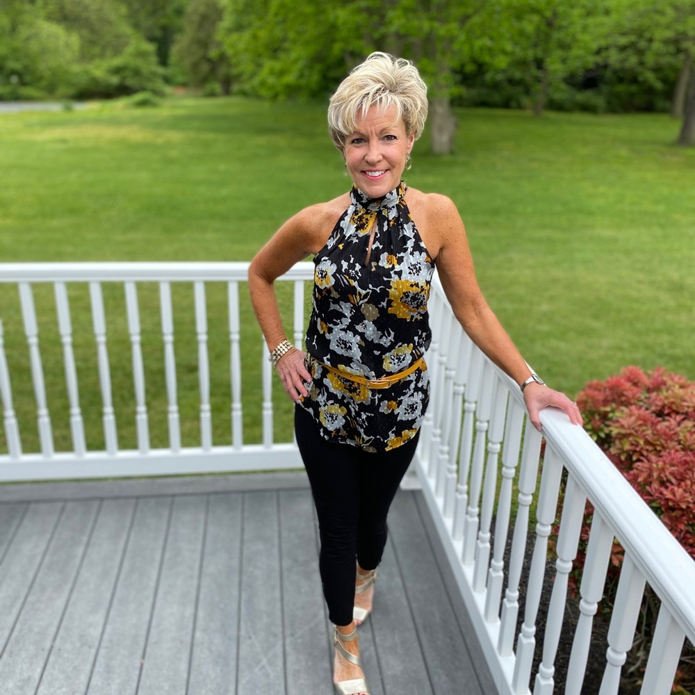 High neck blouse.  Mix of black, gold and white